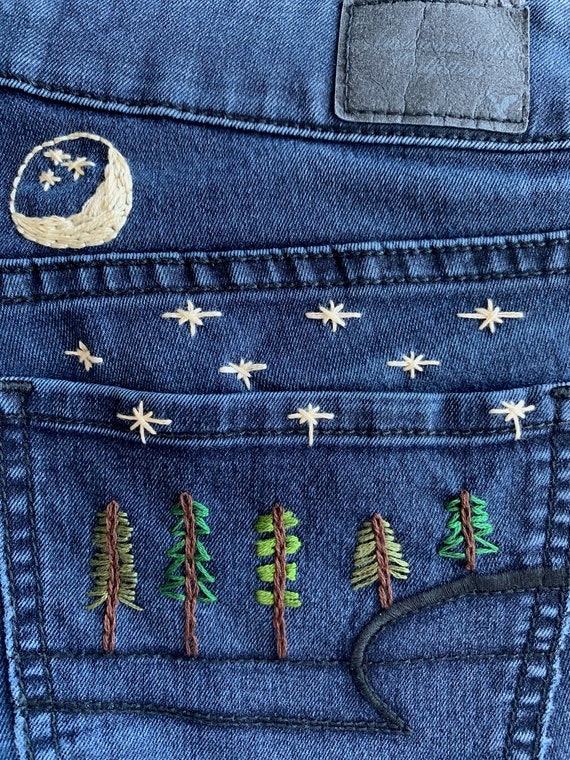 Jeans with 2025 embroidered stars