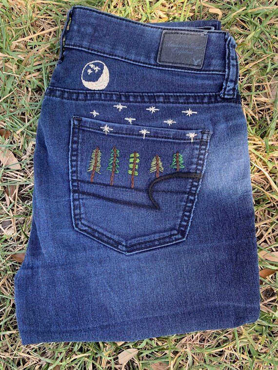 Jeans with 2025 embroidered stars