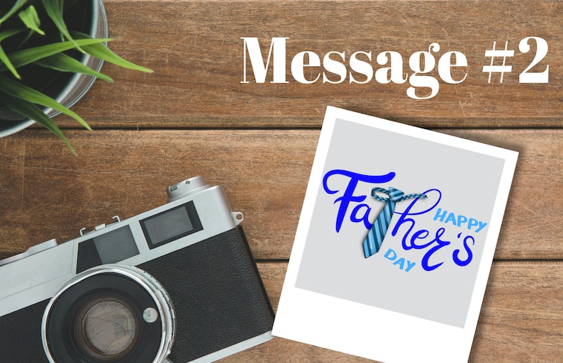 May include: A white photo frame with a blue and white striped tie and the text "Happy Father's Day" in blue lettering. The photo frame is on a wooden surface.