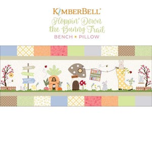 May include: A colorful fabric panel with a whimsical bunny theme. The panel features a carrot house, a mushroom house, a bunny in a yellow rain boot, and a sign that reads "Hoppin' Down the Bunny Trail".