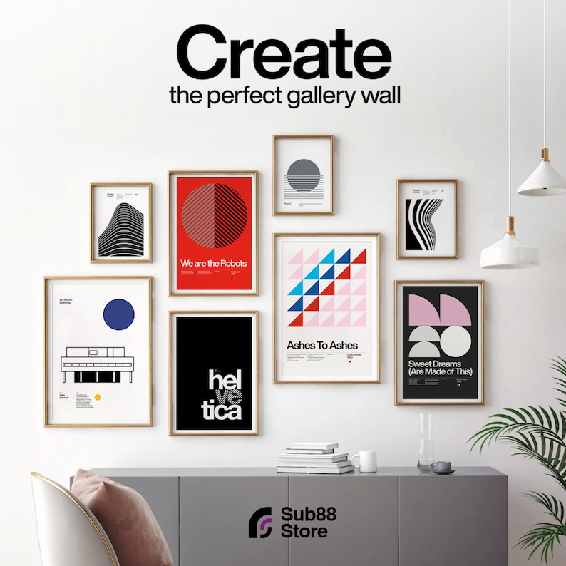 May include: A gallery wall with nine framed prints featuring geometric designs and typography. The prints are arranged in a grid pattern on a white wall. The prints include a red and black geometric design, a black and white geometric design, a blue and pink geometric design, a black and white geometric design, a black and white geometric design, a black and white geometric design, a black and white geometric design, a black and white geometric design, and a black and white geometric design. The prints are all framed in natural wood frames. The wall is decorated with a white lamp and a green plant.