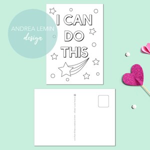 May include: A black and white printable postcard featuring the text "I CAN DO THIS" in bold lettering. The text is surrounded by stars and circles. The postcard is designed for colouring.