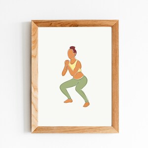 May include: Line art illustration of a person in a yellow sports bra and green pants doing a squat exercise. The illustration is framed in a light wood frame.