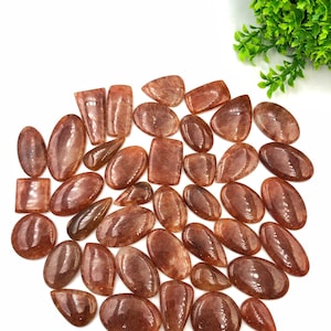 100% naturalny wysokiej jakości gładki kaboszon z kwarcu truskawkowego. Rzadki przedmiot, najlepszy do wyrobu biżuterii, owijanie drutem leczniczym, ręcznie robiony kaboszon