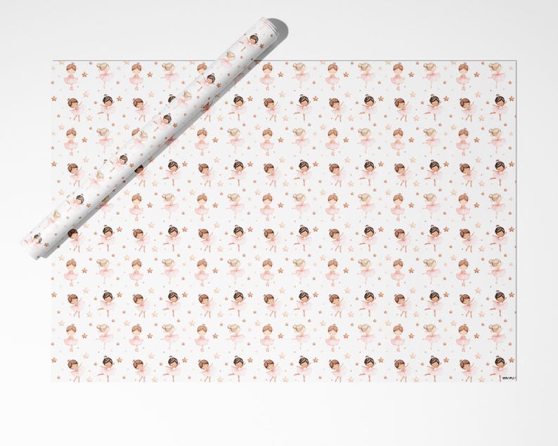 May include: A roll of wrapping paper and a flat sheet of wrapping paper featuring a repeating pattern of illustrated ballerinas in pink tutus, interspersed with small gold stars and dots on a white background, creating a delicate design.