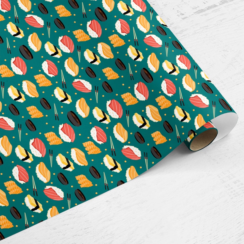 May include: Teal wrapping paper with a repeating pattern of sushi rolls, chopsticks, and black sesame seeds.