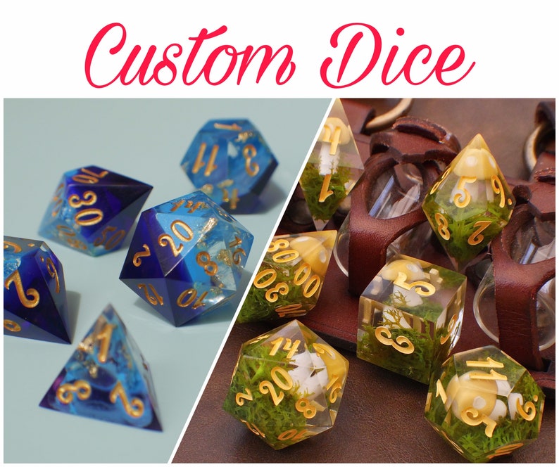 May include: Two sets of custom dice, one set with blue and gold accents and the other with green and gold accents. The dice are made of clear resin with embedded moss, flowers, and glitter.