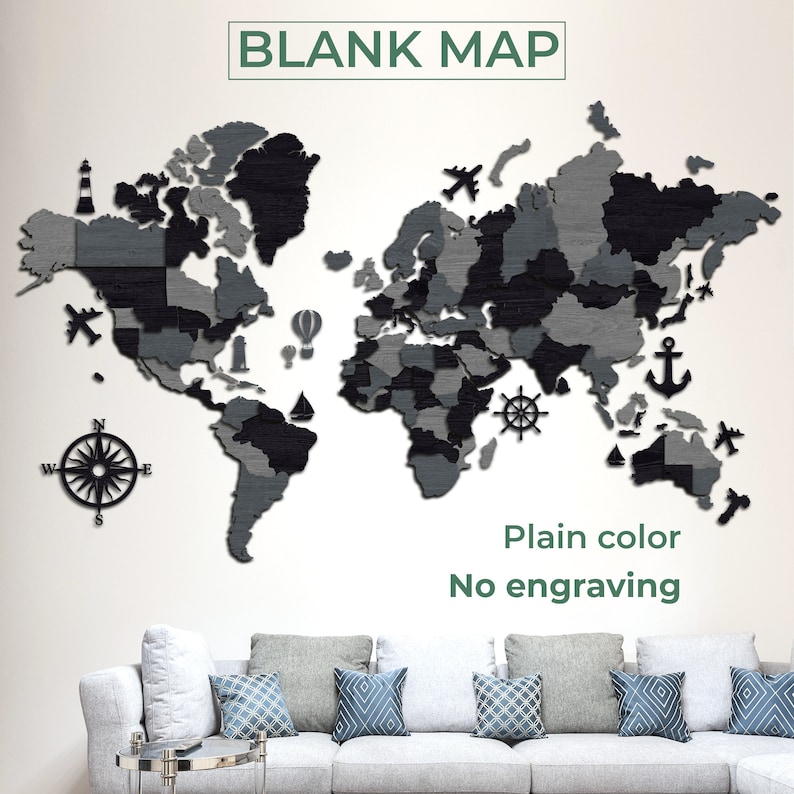 May include: A wooden world map in shades of gray and black, with decorative elements like airplanes, a compass, and an anchor. The text "BLANK MAP" is at the top, and "Plain color No engraving" is at the bottom. The map is mounted on a white wall.
