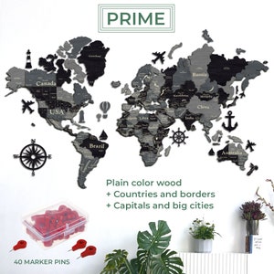 May include: A wooden world map with countries and borders, capitals, and big cities. The map is in shades of gray and black, with decorative icons. Includes 40 red marker pins in a clear container. The word "PRIME" is at the top.
