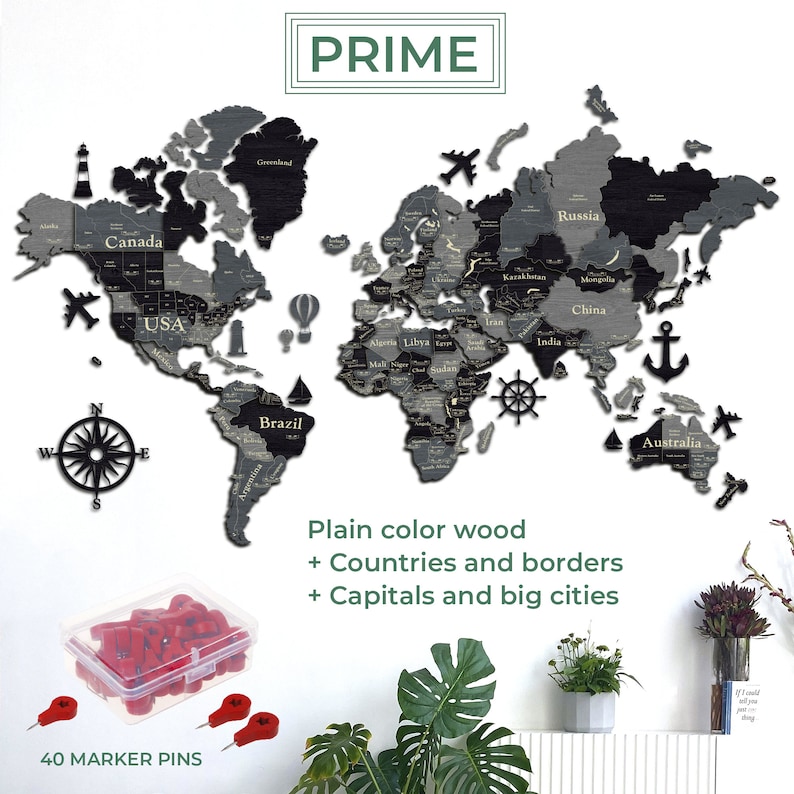 May include: A wooden world map with countries and borders, capitals, and big cities. The map is in shades of gray and black, with decorative icons. Includes 40 red marker pins in a clear container. The word "PRIME" is at the top.