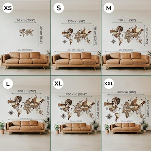 May include: Wooden world map wall art in various sizes, from XS (25.5" wide) to XXL (118" wide). The map is made of brown wood and includes compass and anchor details. Each size is displayed above a brown leather sofa.