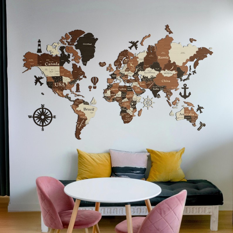 a map of the world on the wall of a living room