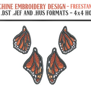 May include: Machine embroidery design showing four orange and black butterfly wing patterns. The wings have detailed stitching on a white background. The text at the top reads "MACHINE EMBROIDERY DESIGN - FREESTANDING .PES .DST .JEF AND .HUS FORMATS - 4x4 HOOPS."