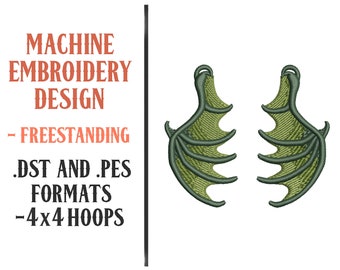 May include: Machine embroidery design of two green dragon wings, freestanding, in .DST and .PES formats, for 4x4 hoops.