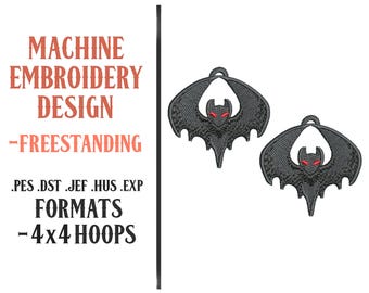 May include: Machine embroidery design featuring two black bat-shaped designs with red eyes. The text reads "MACHINE EMBROIDERY DESIGN - FREESTANDING" and lists file formats and hoop size.