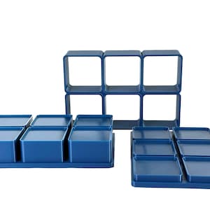 May include: A set of blue modular storage cubes. The cubes can be stacked or arranged in a variety of configurations. The set includes a variety of sizes and shapes.