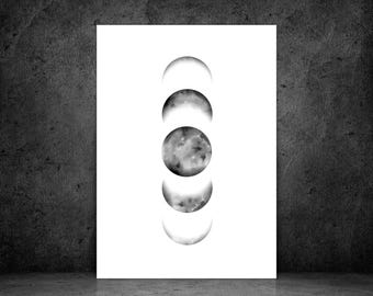 May include: A black and white print featuring the phases of the moon. The artwork shows a series of five moon phases, ranging from crescent to full moon, against a white background. The print is displayed on a white rectangular canvas.