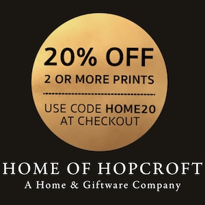 May include: A gold circle with the text "20% OFF 2 OR MORE PRINTS USE CODE HOME20 AT CHECKOUT" on a black background. Below the circle is the text "HOME OF HOPCROFT A Home & Giftware Company".