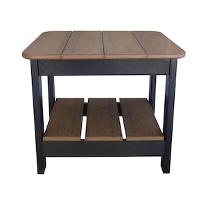 May include: A black wooden outdoor table with a brown top and a lower shelf. The table has a simple, rectangular design.