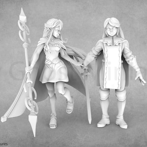 May include: Two white painted figurines, one female with a staff and a flowing cape, the other male with a sword and a cape. Both figures are standing on a gray background.