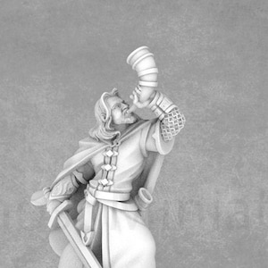 May include: A white miniature figurine of a person wearing a long robe and holding a sword and a horn. The person is blowing into the horn.