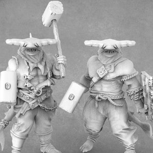 May include: Two detailed miniature figures of humanoid creatures with hammerhead-shaped heads. One figure holds a large mallet, the other a shield. Both wear armor and have fish-like tails. The figures are in shades of gray.