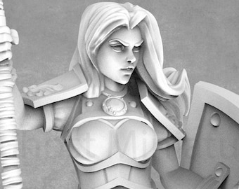 May include: A white plastic miniature figurine of a female warrior holding a spear and a shield. The warrior is wearing armor and has long hair.