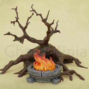 May include: A miniature fantasy scene featuring a stone fire pit with a bright orange and yellow flame. A large, detailed brown tree with exposed roots and branches is behind the fire pit. The scene is set against a light yellow background.