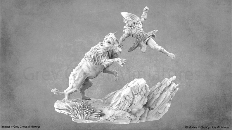 May include: A white miniature figurine depicting a warrior battling a lion. The warrior is leaping through the air, sword raised, while the lion stands on its hind legs, claws extended. The scene is set on a rocky base with some small plants.