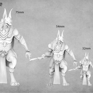 May include: Size reference image showing four miniature figures of a jackal-headed creature in different sizes: 75mm, 54mm, 32mm, and 28mm. The figures are all white and are posed in different stances.
