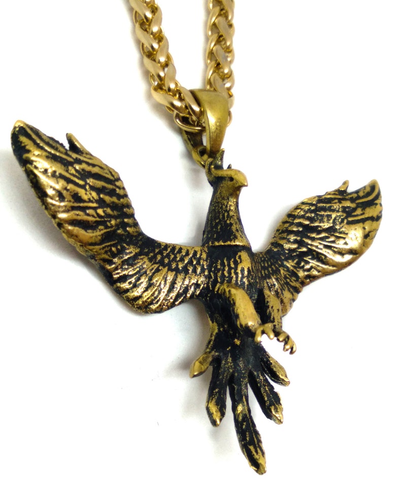 bird necklace transformation symbol in oxidised bronze hand carved firebird Phoenix pendant tribal jewelry. rebirth necklace