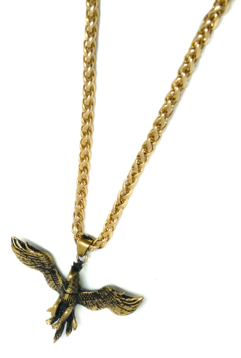 bird necklace transformation symbol in oxidised bronze hand carved firebird Phoenix pendant tribal jewelry. rebirth necklace