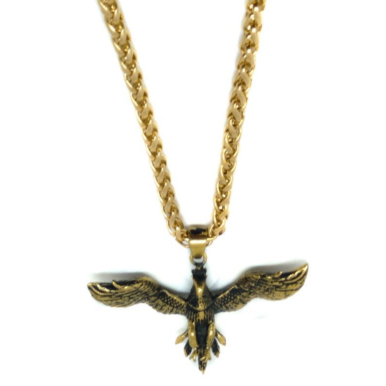 bird necklace transformation symbol in oxidised bronze hand carved firebird Phoenix pendant tribal jewelry. rebirth necklace