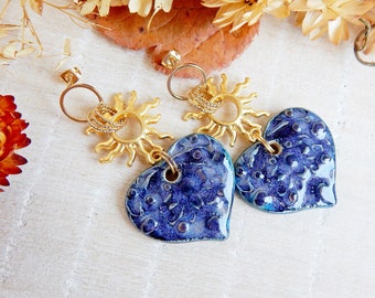 Statement earrings dangle with heart ceramic charms, Long gold sunburst earrings, Unique handmade porcelain earrings, Bold boho jewelry