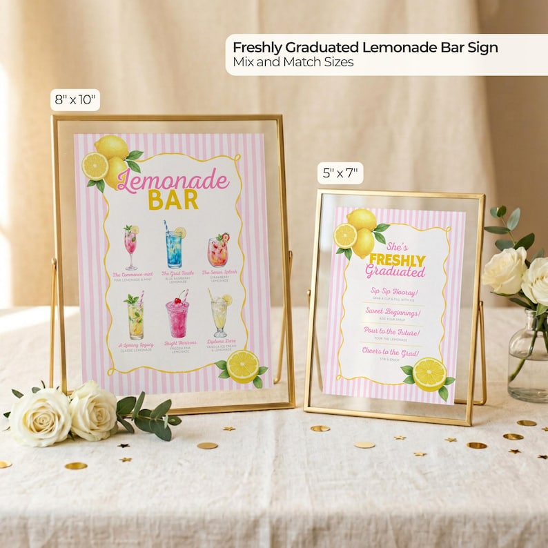 May include: Two framed signs with gold frames. The larger sign is 8" x 10" and features a "Lemonade Bar" design with pink stripes and illustrations of lemonade drinks. The smaller sign is 5" x 7" and reads "She's Freshly Graduated".