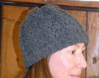 Warm, cozy shetland wool hat with cable stitch detail