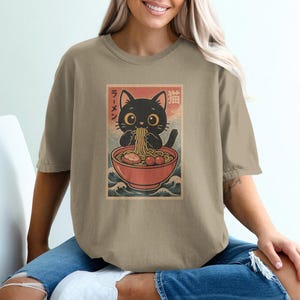 Cute Black Cat Eating Ramen T-Shirt, Adorable Noodle Cat Graphic Tee, Kawaii Kitty Eating Ramen Shirt, Casual Funny Cat Lover Gift