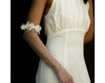 Mesh Bridal Gloves/Sleeves in White with Floral design details.