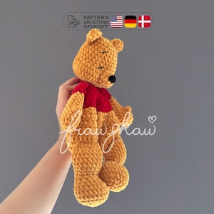 Crochet snuggler pattern, Pooh, Bear, pdf in English (US terms), German and Danish.