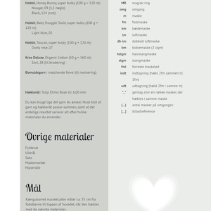 May include: A page of crochet instructions in Danish, featuring yarn and hook details, abbreviations, and other materials. The text includes measurements for a project, approximately 35 cm from foot to head. A heart graphic is in the bottom right.