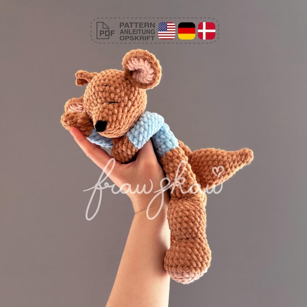 Padrão de crochê para aconchegar um canguru, naninha, em PDF em inglês (termos americanos), alemão e dinamarquês.