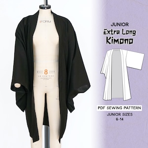 May include: A black kimono sewing pattern for children, sizes 6-14. The pattern is for an extra long kimono. The pattern is shown on a dress form and a line drawing.