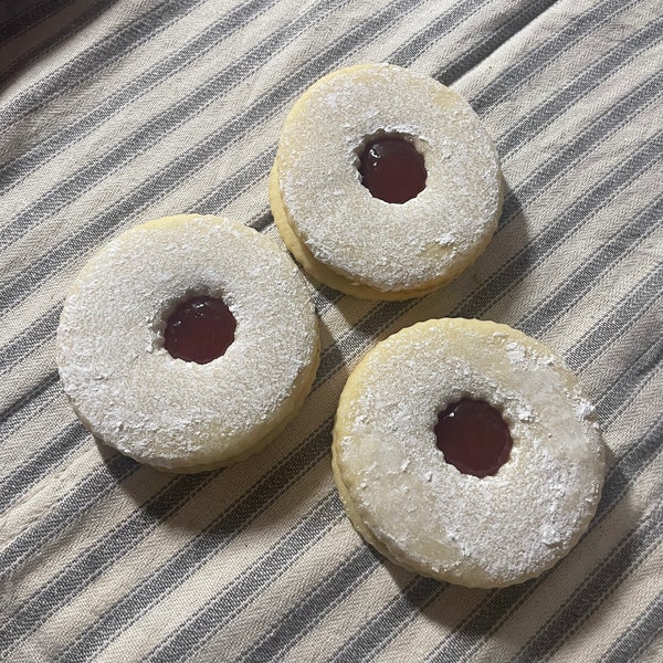 Homemade Linzer cookies with strawberry jam. Homemade Sugar Cookies. Six or a Dozen. Made from Scratch.