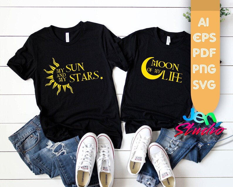 May include: Two black t-shirts with yellow text. The first shirt says "My Sun and My Stars." The second shirt says "Moon of My Life."