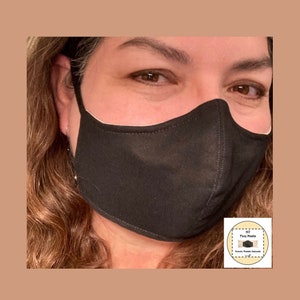Cup shaped cotton face mask of with ear and nose adjusters, made to order.