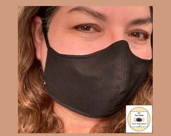Cup shaped cotton face mask of with ear and nose adjusters, made to order.