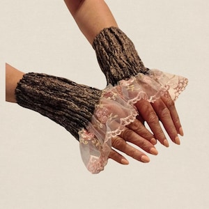 Elegant handmade wool arm warmers for women. Fingerless mitts were made using nuno felting technique, also known as a wet felting.