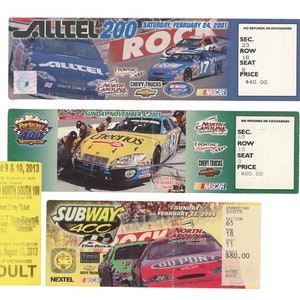 May include: Three NASCAR race tickets. The tickets are for the Alltel 200, Pop Secret 400, and Subway 400 races. The tickets feature images of race cars and include dates, locations, and prices. The tickets are in various colours.