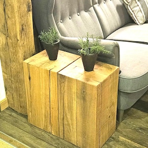 Wooden block coffee table decorative stool side table made of oak -cube- solid wooden block made of four thick beams glued together.