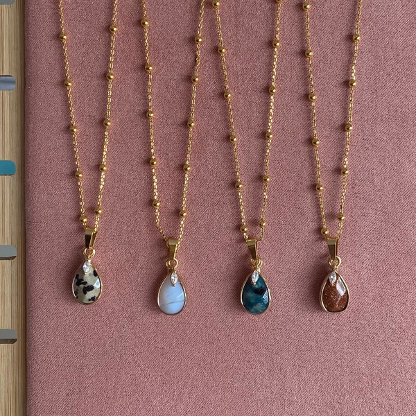 Chain necklace plated with fine 18 carat gold, natural stone faceted drop pendant, white rhinestones, opal, jasper, apatite, glitter sand